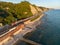 A bird`s-eye view of Gizel-Dere railway station and passing train along the Black Sea coast on a warm summer evening