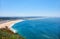 Bird`s-eye view on Nazare beach riviera on the coast of Atlantic