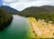 Bird`s eye view photo of Lightning Lake in E. C. Manning Provincial Park while people are enjoying outdoor activities at the lake