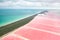A bird`s-eye view of the pink salt lakes separated by a sand spit from the Gulf of Mexico on the Yucatan