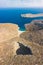 Bird`s eye view of Sikati cave and coast nearby, Kalymnos island, Greece.