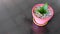 A Bird`s Nest Snake Plant, Sansevieria Hahnii, in a cute pink pot