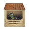 Bird sitting in birdhouse