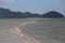 Bird stand on beach when water down