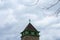 A Bird on Top of a Church Tower