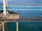 Bird view of Old and New Baishatuo Yangtze River Railway Bridge under blue sky