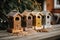 birdhouse feeder with a variety of birdseed flavors, each for different types of birds