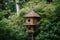 a birdhouse with a treetop view, surrounded by lush greenery