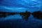 Birds above confluence of rivers Labe and Ohre in spring evening