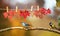 birds chickadee and creeper sit in the garden under a banner with the word autumn carved on red maple leaves on clothespins