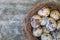 Birds eggs in nest, wooden background