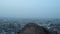 Birds eye ariel view of blue city of Jodhpur Rajasthan India at the misty winter morning panning shot