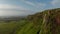 Birds eye flying toward breathtaking Seljalandsfoss waterfall, the most famous cascade in Iceland. Drone point of view