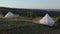 Birds eye view capturing video with drone at the campsite amazing landscape in the middle of nature