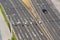 Birds eye view of half-empty road with cars, driverless technology concept