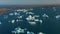 Birds eye view of Jokulsarlon lake with iceberg floating and drifting. High angle view panorama of Vatnajokull national