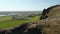 Birds eye view of majestic Iceland green meadow countryside. Aerial view revealing turistic campsite and people camping