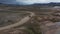 Birds eye view off road jeep driving in wild landscape, Iceland. Aerial view 4x4 vehicle speeding traveling across mossy