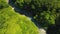 birds-eye view of Okatse river surrounded by green forest, Martvili, Georgia