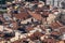 Birds eye view of red-tiled rooftops of Florence historic centre in Italy