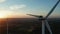 Birds eye view on Wind Power, Turbine, Windmill, Energy Production at sunrise - Clean and Renewable Energy