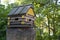 Birds feeder in the form of a timbered lodge