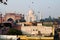 Birds fly over the Taj Mahal. Panoramic view from the roof.