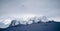 Birds flying over Antarctic Winter Landscape.