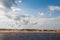 Birds flying over a lake in the dunes