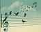 Birds gather around a talented song bird who sings as they all sit on a musical treble clef staff