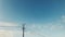 Birds resting on a wire ,Electric Pole and blue sky background