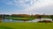 Birds swim in the pond in autumn park, panorama