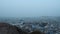 Birdseye ariel view of blue city of Jodhpur Rajasthan India at the misty winter morning panning shot