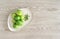 Birdseye View of Green Zested Key Limes on Eco Friendly Plate