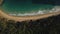 Birdseye view of Playa Grande bay - Aragua State, Venezuela, pan right and rocket away