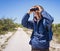 Birdwatching Man Hiking on a Path in national park