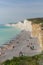 Birling gap beach and Seven Sisters white cliffs with holidaymakers