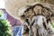 BIRMINGHAM, UK - March 2018 CloseUp of Fountain made of Stone with Children Holding Hands Supporting Basin on their