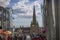 BIRMINGHAM, UK - March 2018 Multiracial People Walking along Busy Thoroughfare in Town. Cathedral with High Turret and
