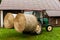 BIRMINGHAM, UK - March 2018 Two Bundle of Haystack Attached at the Back of Mini Truck. Big Warehouse Storage for Bale of