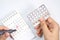 Birth control pills , calendar and notepad on table