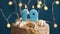Birthday cake with 19 number candle on blue backgraund