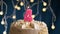 Birthday cake with 4 number pink burning candle on blue background. Candles blow out. Slow motion and close-up view