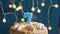 Birthday cake with 7 number candle on blue backgraund. Candles blow out. Slow motion and close-up