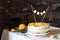 Birthday cake for a birthday in winter with cream and oranges
