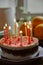 Birthday cake with burning thin candles