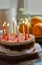 Birthday cake with burning thin candles