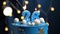 Birthday cake number 26 stars sky and moon concept, blue candle is fire by lighter. Copy space on right side of screen. Close-up