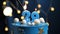 Birthday cake number 29 stars sky and moon concept, blue candle is fire by lighter. Copy space on right side of screen. Close-up