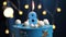 Birthday cake number 8 stars sky and moon concept, blue candle is fire by lighter and then blows out. Copy space on
